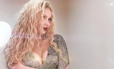 Оля Полякова