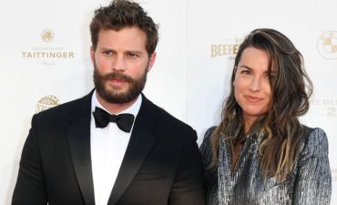 Джейми Дорнан и Амелия Уорнер