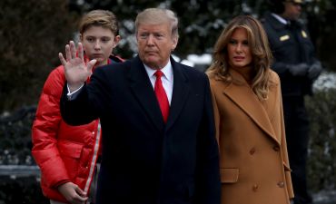 Мелания и Дональд Трамп с сыном Бэрроном