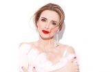 От строгого костюма до изысканного платья: Оксана Марченко показала яркие образы