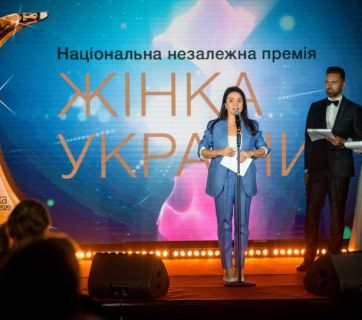 премія