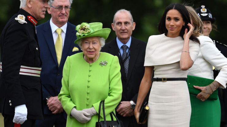 Меган Маркл в элегантном белом платье на официальном мероприятии