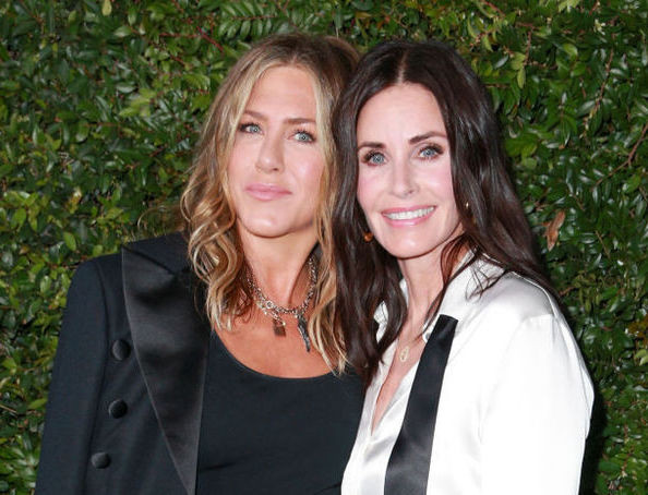 Энистон и Кокс